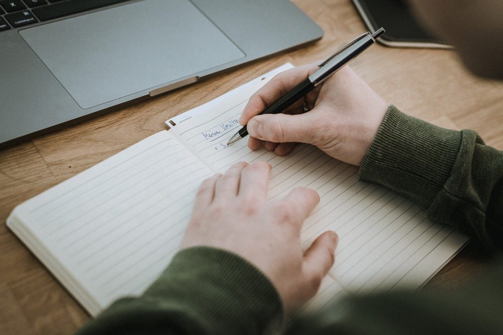 paper, book, laptop